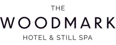 The Woodmark Hotel & Still Spa logo